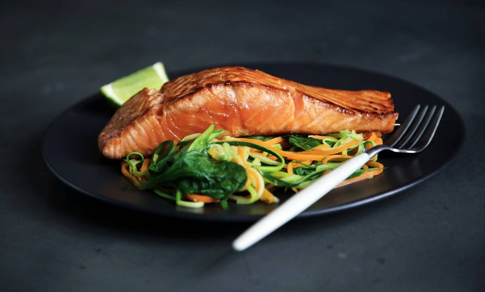 american dinner food salmon with roasted vegetables