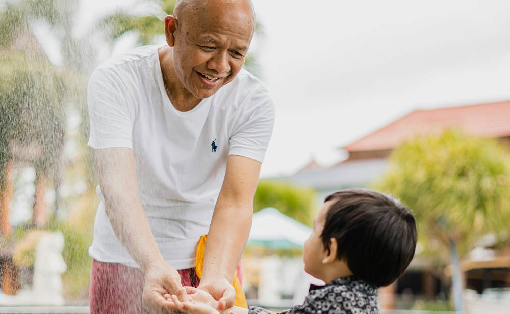 traditional parenting grandpa loving kid